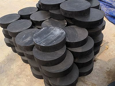 弥勒市板式橡胶支座由若干层橡胶片与薄钢板经加压硫化